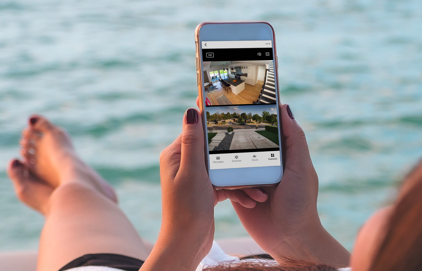 Women in beach watching phone